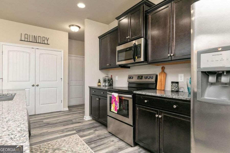 Furnished interior view inside a new home in Cobblestone Crossing Commons, Byron (Image 16).