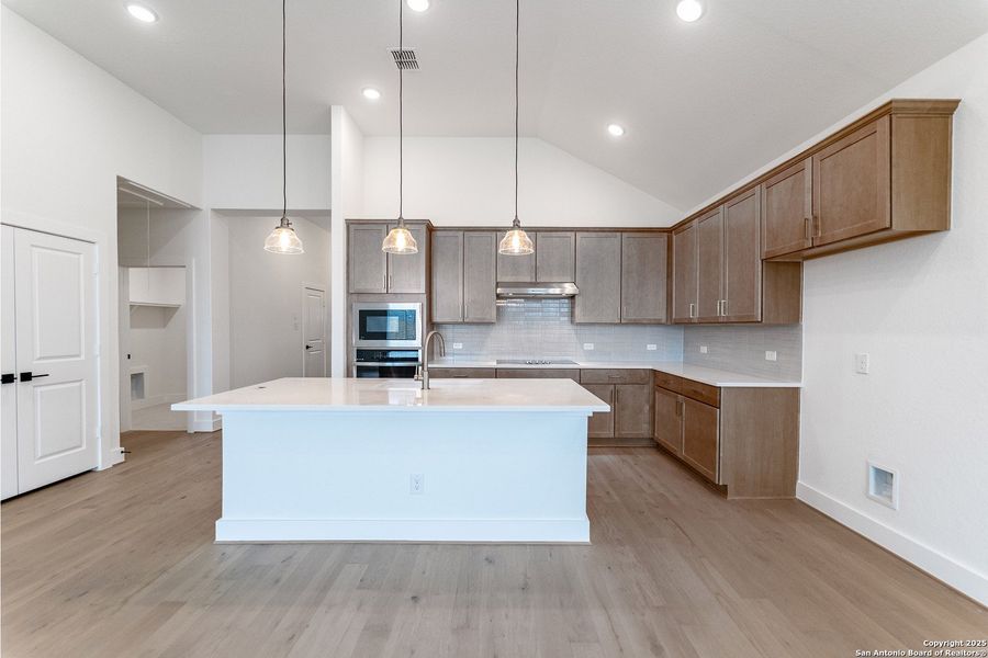 Furnished interior view inside a new home in The Woodlands at Medina Hills, Mico (Image 3).
