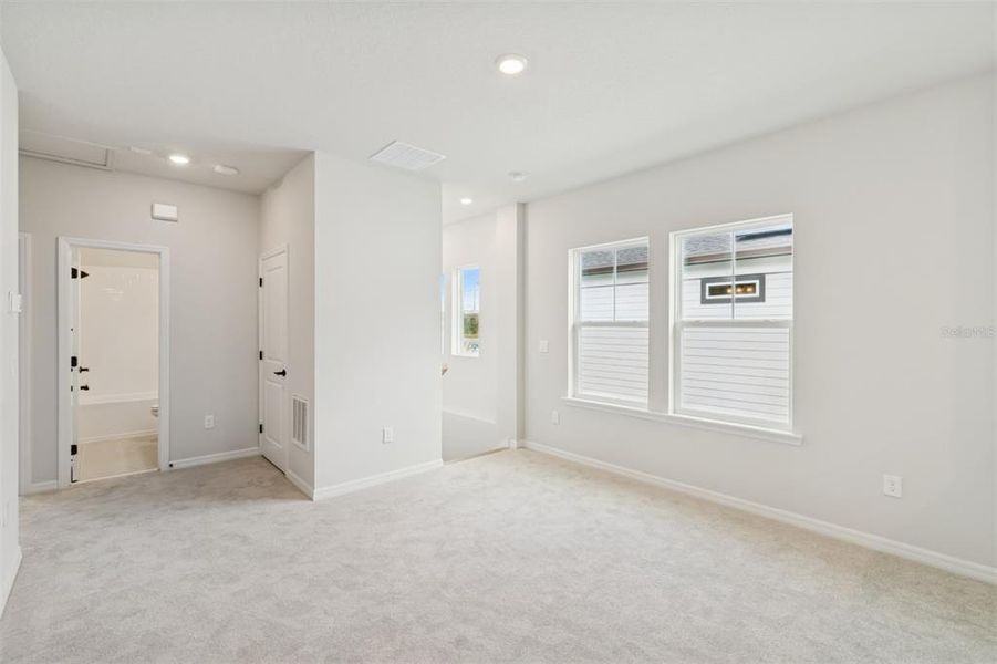Spacious, unfurnished interior of a new home in Laureate Park at Lake Nona - Garden Series, Orlando (Image 33).