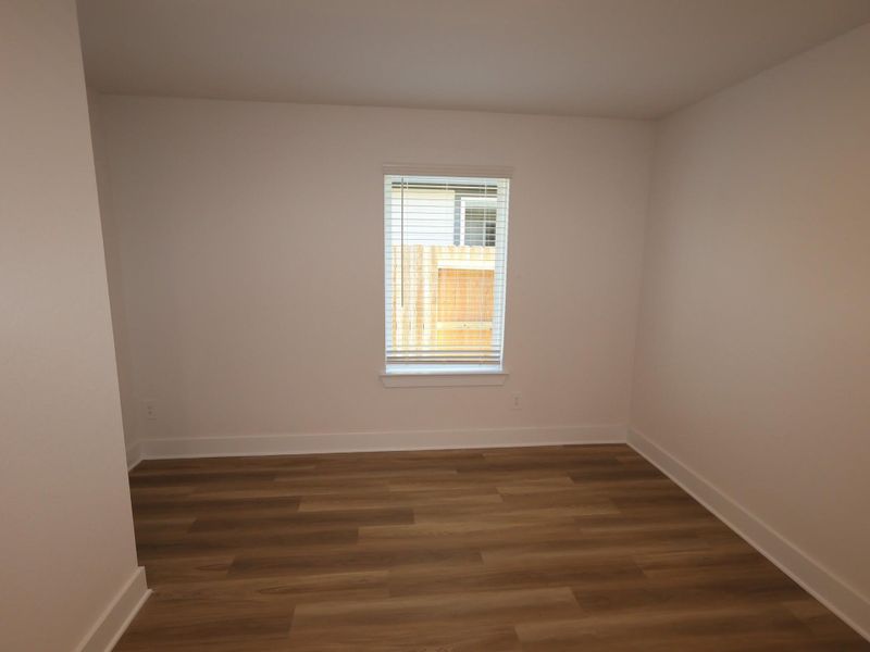 Spacious, unfurnished interior of a new home in Lone Star Landing, Montgomery (Image 29).