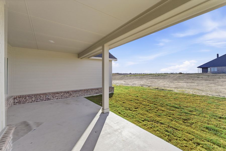 Exterior details and patio area of a home in Clear Sky Addition, Valley View (Image 20).