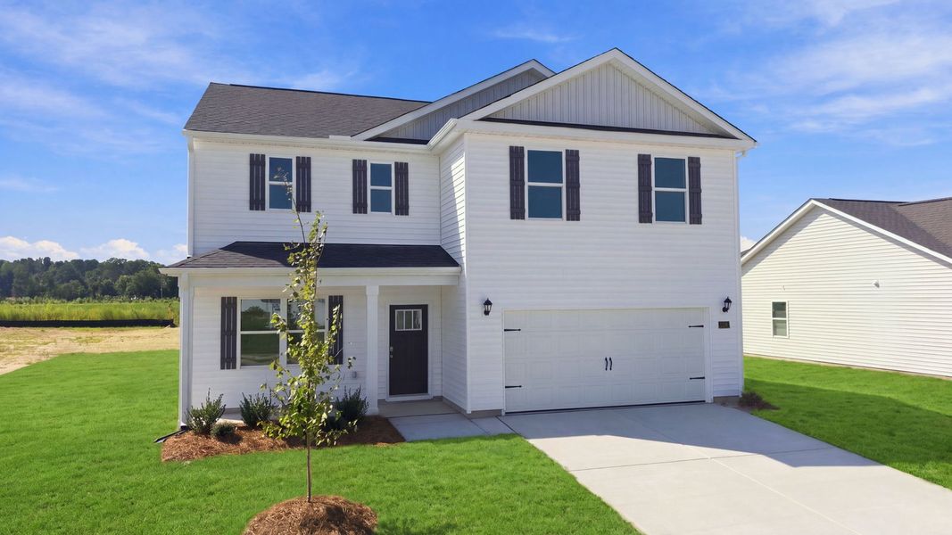 Front exterior of a new home in East Ridge, Ayden, NC, highlighting curb appeal (Image 18).