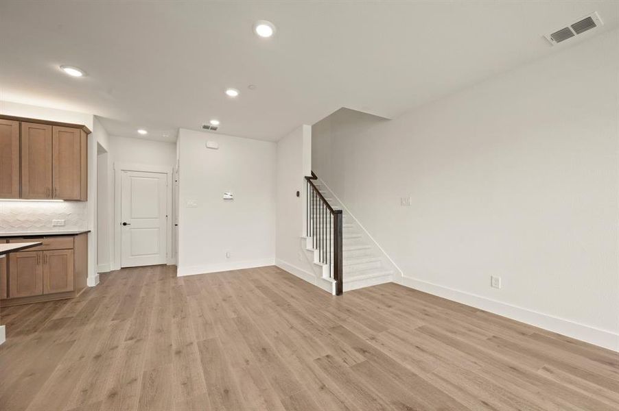 The dining area offers a perfect space for cozy family meals.