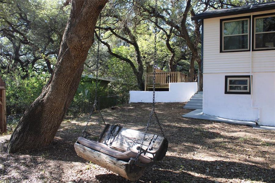 View of yard with a deck and stairway View of yard with a deck and stairway