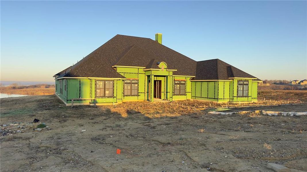 View of front of house with a shingled roof View of front of house with a shingled roof