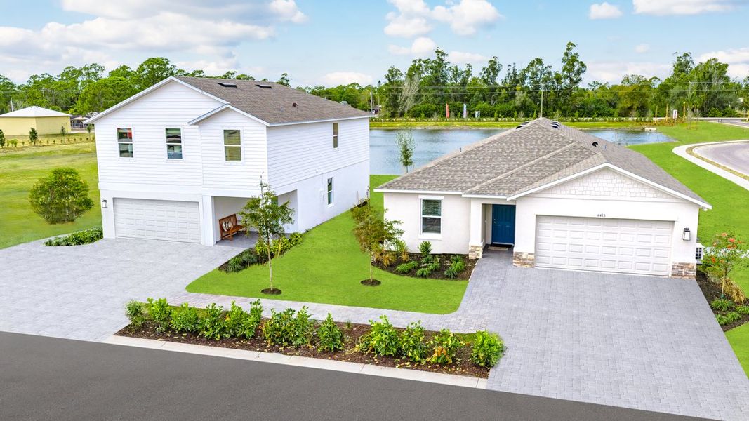 Front exterior of a new home in Solena, North Fort Myers, FL, highlighting curb appeal (Image 2). Front exterior of a new home in Solena, North Fort Myers, FL, highlighting curb appeal (Image 2).