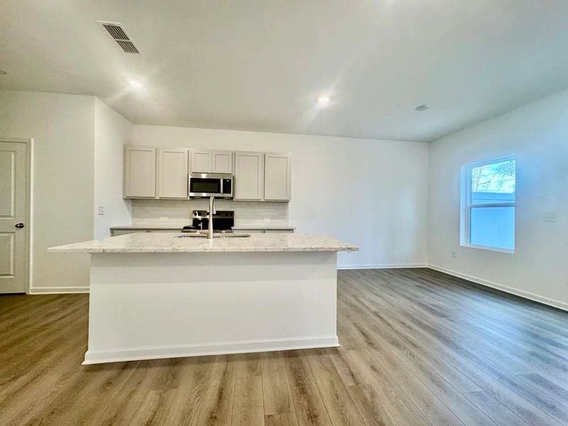 Kitchen featuring Milan Collection Finishes