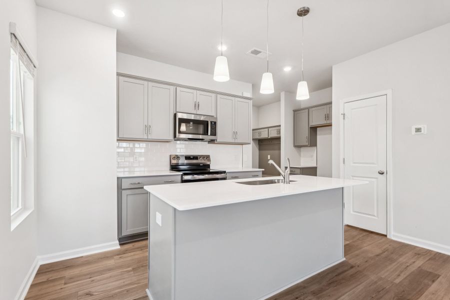 Furnished interior view inside a new home in Lakeview Village, Charlotte (Image 5). Furnished interior view inside a new home in Lakeview Village, Charlotte (Image 5).