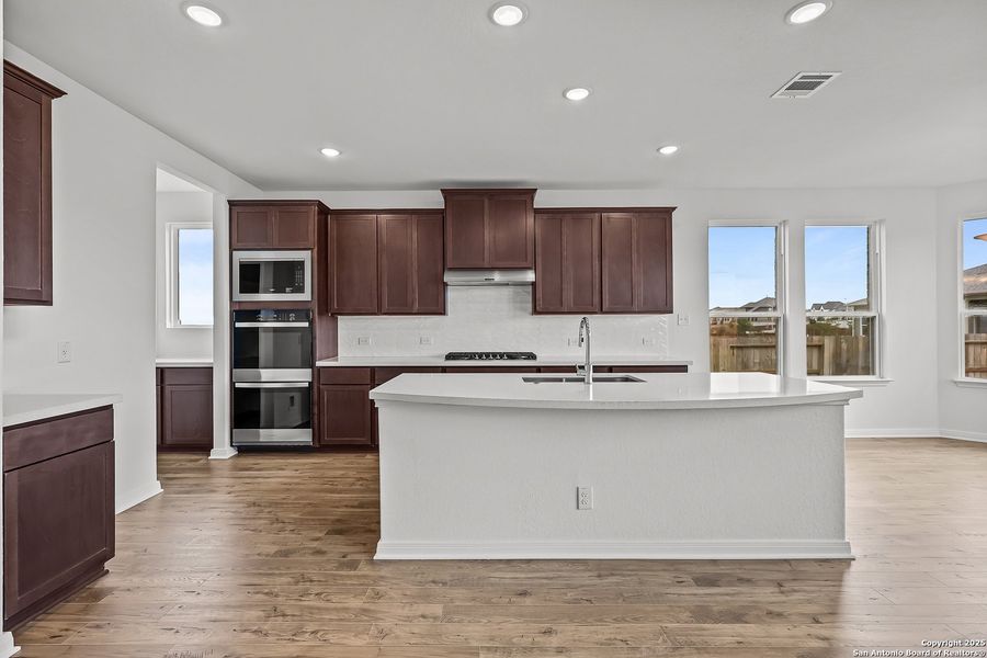 Furnished interior view inside a new home in Homestead 75', Schertz (Image 7).