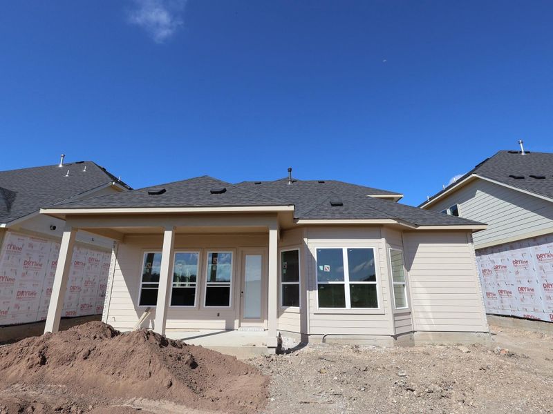 Front exterior of a new home in Barksdale, Leander, TX, highlighting curb appeal (Image 2). Front exterior of a new home in Barksdale, Leander, TX, highlighting curb appeal (Image 2).