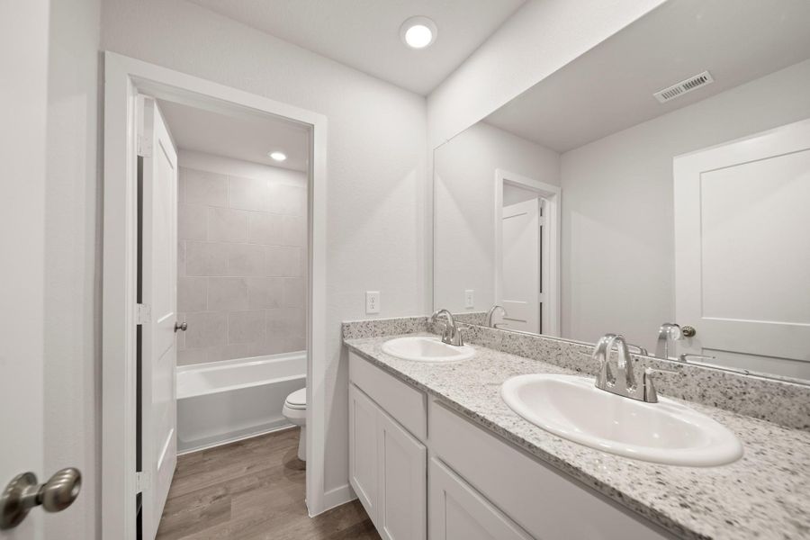 Furnished interior view inside a new home in Lexington Heights, Willis (Image 6). Furnished interior view inside a new home in Lexington Heights, Willis (Image 6).