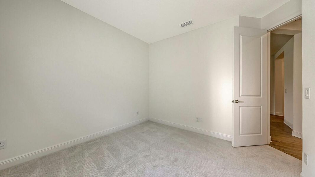 Spacious, unfurnished interior of a new home in Palm Grove Real Estate and Homes for Sale in Lakewood Ranch, FL - Neal Communities, Lakewood Ranch (Image 58).