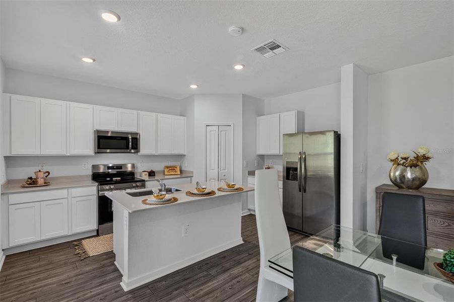 Furnished interior view inside a new home in Tara Forest East, Alachua (Image 35).