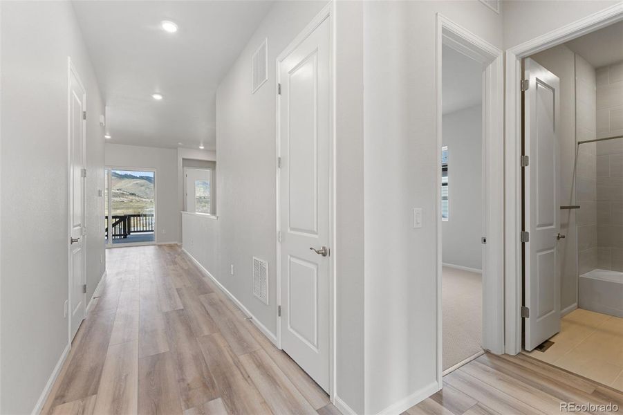 Spacious, unfurnished interior of a new home in The Manors Collection at Golden Overlook, Lakewood (Image 26).