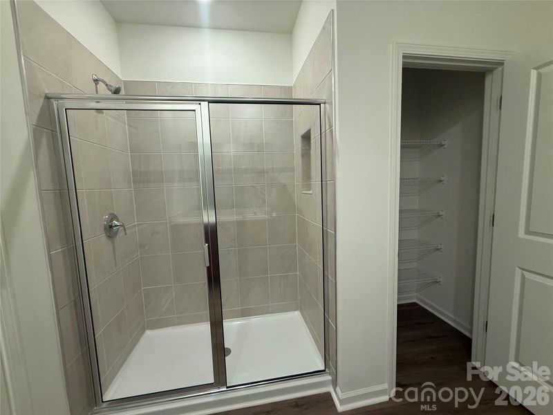 Primary shower and linen Primary shower and linen