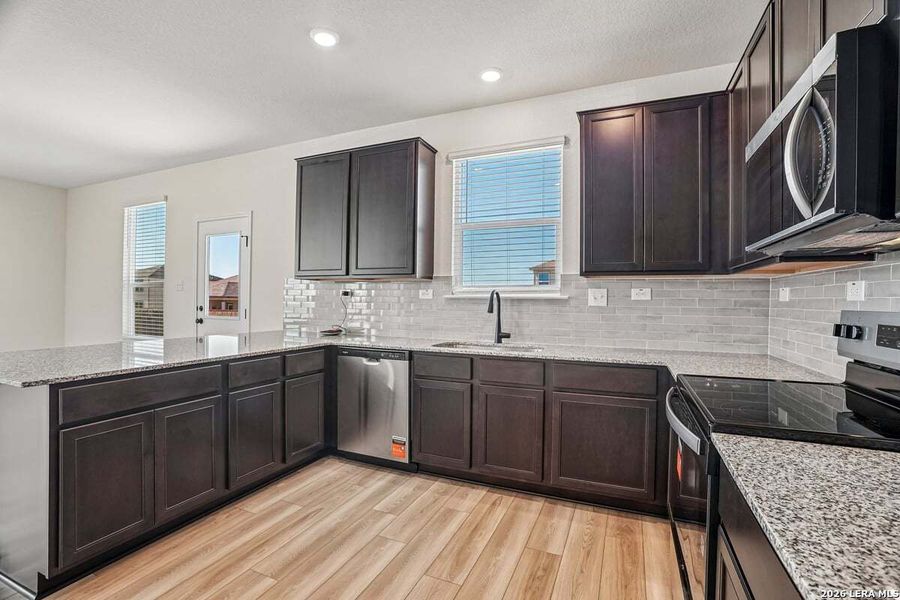 Furnished interior view inside a new home in Legend Heights - Heritage Collection, New Braunfels (Image 8).