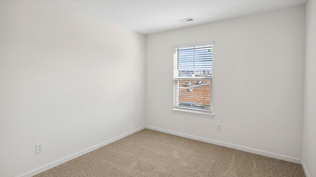 Spacious, unfurnished interior of a new home in The Hideaway at Fox Meadows, Bluff City (Image 25).