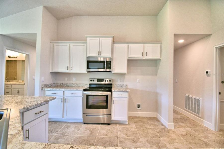 Furnished interior view inside a new home in , Lake Wales (Image 6).