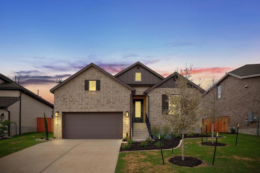 Front exterior of a new home in Parkside Peninsula, Georgetown, TX, highlighting curb appeal (Image 2). Front exterior of a new home in Parkside Peninsula, Georgetown, TX, highlighting curb appeal (Image 2).