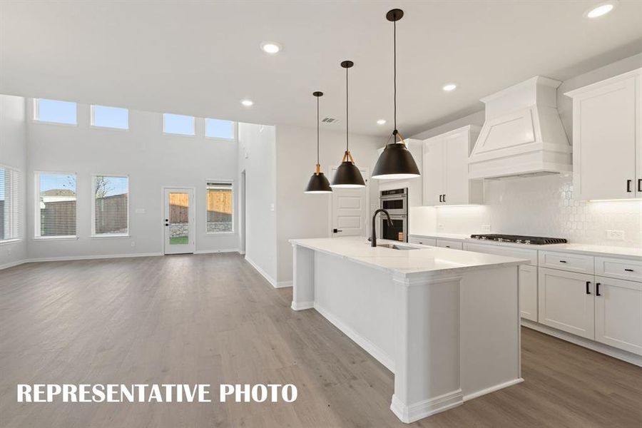 Beautiful cabinetry, lovely backsplash, gorgeous countertops, stainless appliances....what more could you ask for in your dream kitchen?  REPRESENTATIVE PHOTO