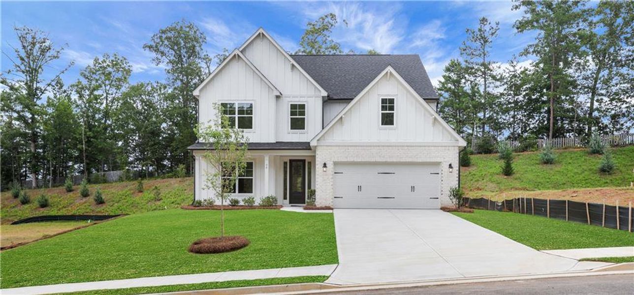 Front exterior of a new home in Arbor West, Dawsonville, GA, highlighting curb appeal (Image 26).
