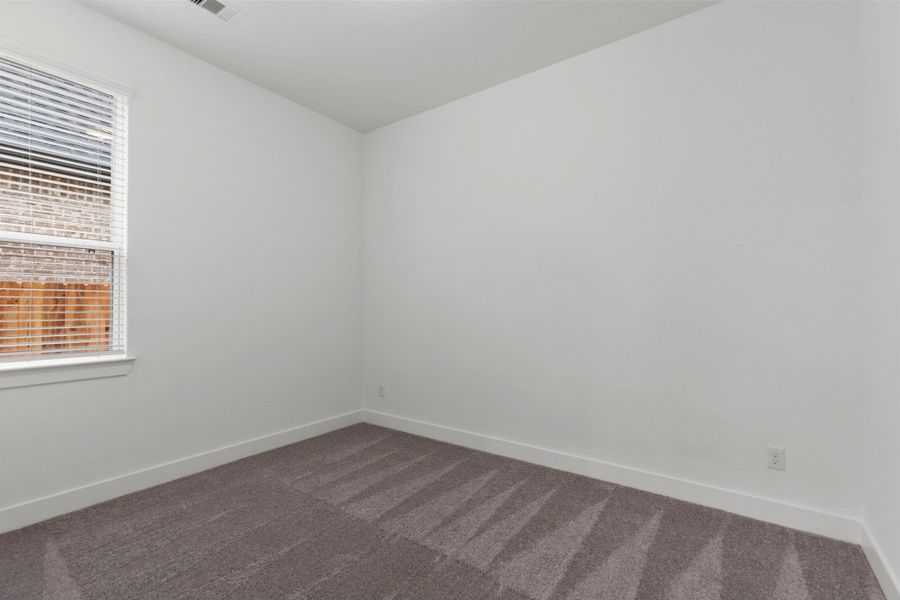 Spacious, unfurnished interior of a new home in Blue Heron, Mont Belvieu (Image 17).