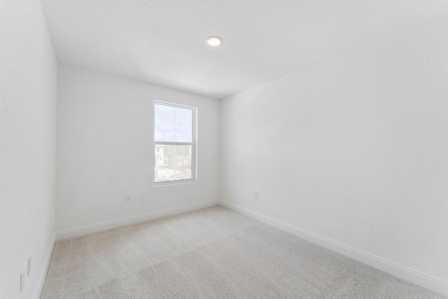 Spacious, unfurnished interior of a new home in Salerno Reserve Townhomes, Stuart (Image 26).