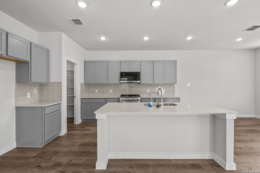 Furnished interior view inside a new home in Agave, San Antonio (Image 7).