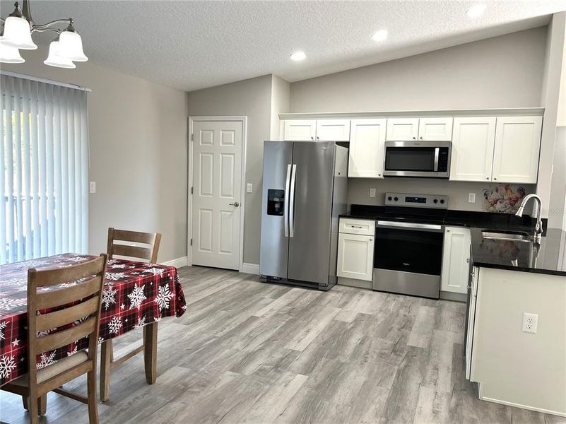 Furnished interior view inside a new home in , Dunnellon (Image 12).