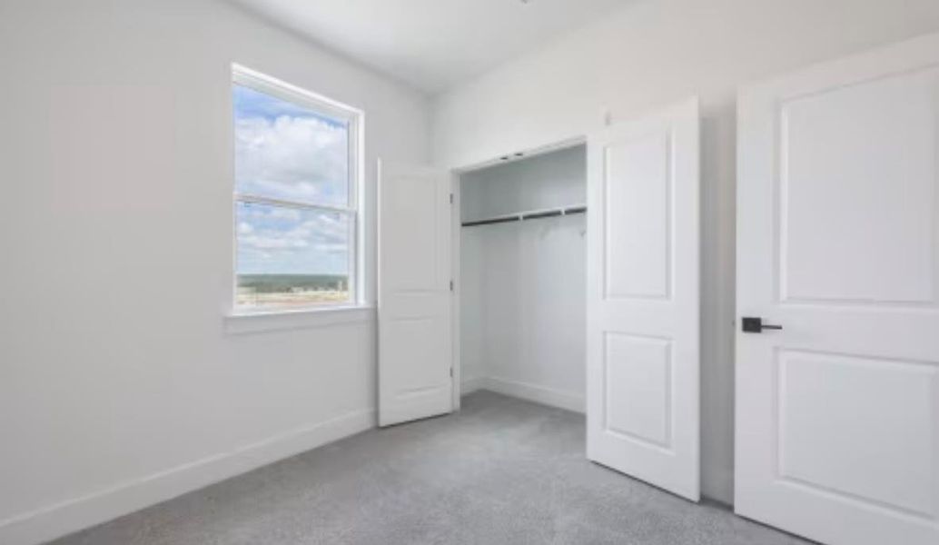 Spacious, unfurnished interior of a new home in Ryegrass Collection – Freedom at Anthem, Kyle (Image 12).