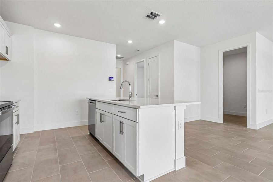 Furnished interior view inside a new home in Lakeside at Satilla, St. Cloud (Image 11).