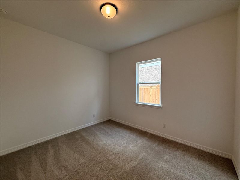 Spacious, unfurnished interior of a new home in Wildrye, Waller (Image 28).