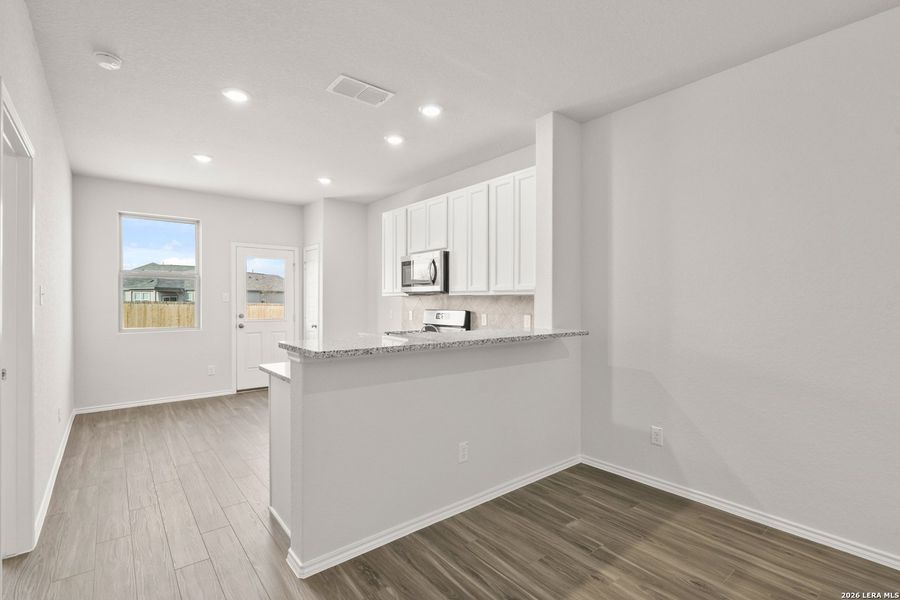 Furnished interior view inside a new home in Blue Ridge Ranch, San Antonio (Image 7).