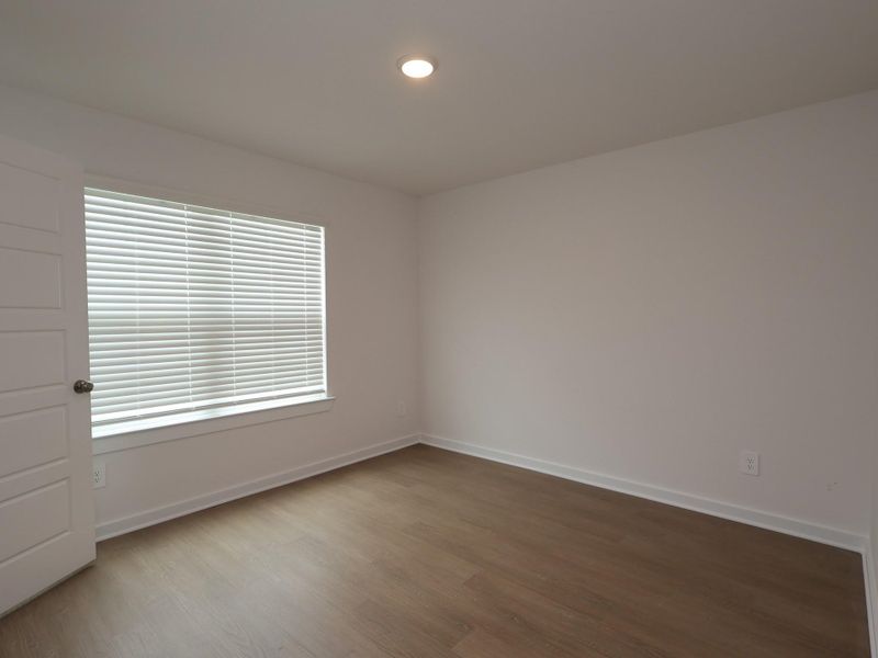 Spacious, unfurnished interior of a new home in Pinewood at Grand Texas, New Caney (Image 25). Spacious, unfurnished interior of a new home in Pinewood at Grand Texas, New Caney (Image 25).
