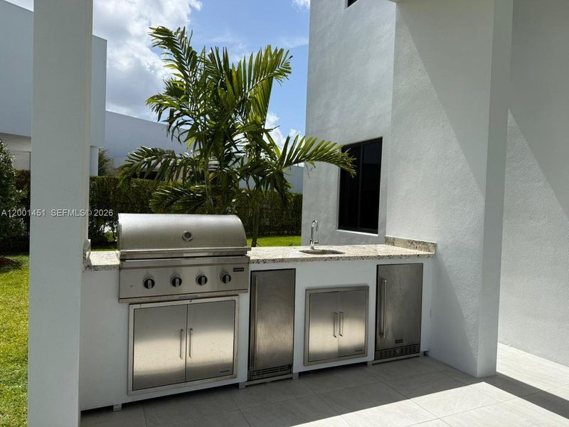 Exterior details and patio area of a home in , Weston (Image 3).