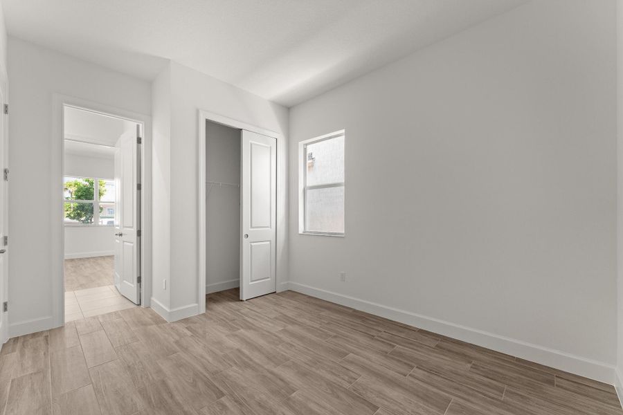 Spacious, unfurnished interior of a new home in Tradition - Seville, Port St. Lucie (Image 14). Spacious, unfurnished interior of a new home in Tradition - Seville, Port St. Lucie (Image 14).