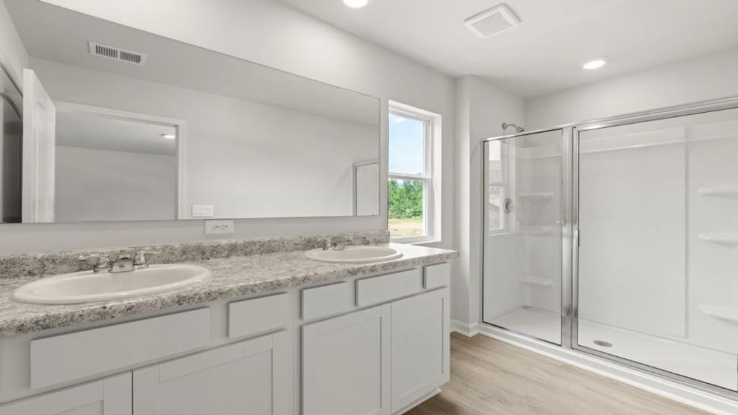 Furnished interior view inside a new home in Oaks at Cedar Grove, Fairburn (Image 7).