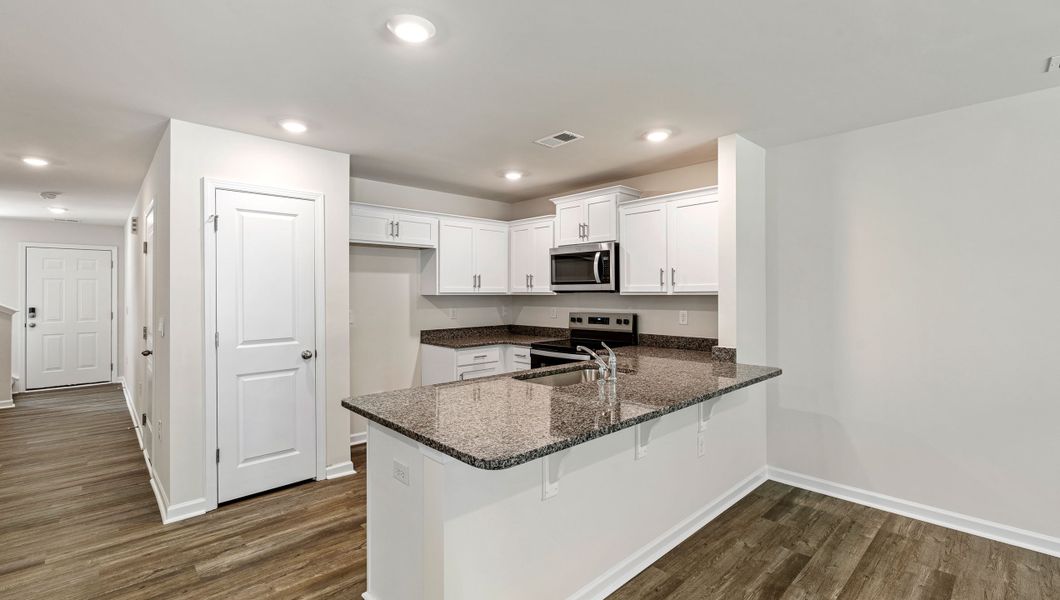 Furnished interior view inside a new home in Chestnut Ridge Townhomes, Greenville (Image 5).