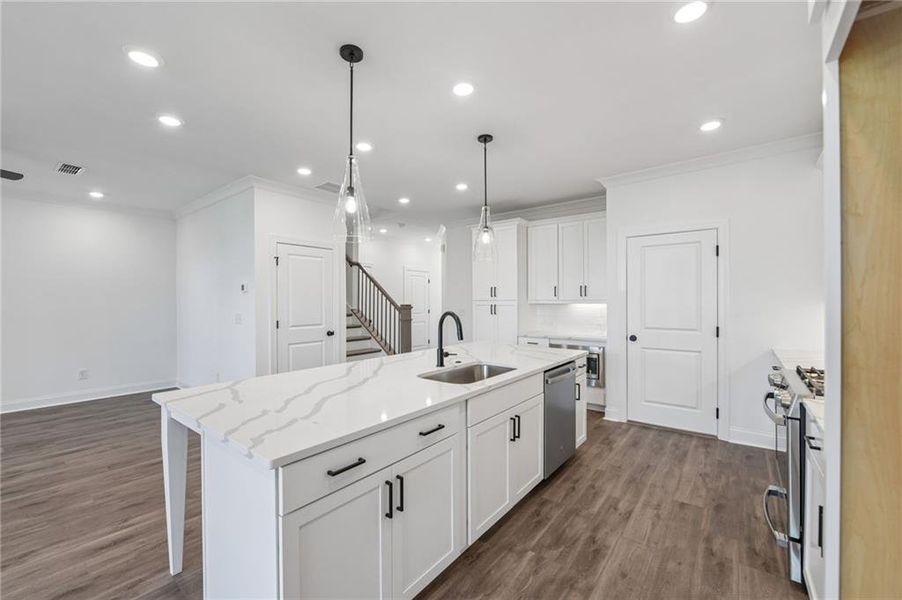 Furnished interior view inside a new home in Millcroft Townhomes, Buford (Image 5). Furnished interior view inside a new home in Millcroft Townhomes, Buford (Image 5).
