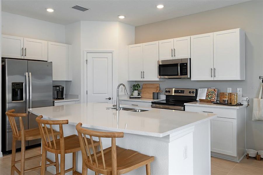 Furnished interior view inside a new home in Vinterra Townhomes, Nokomis (Image 8).