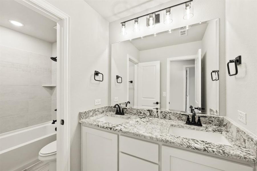 Furnished interior view inside a new home in The Retreat at North Grove 60, Waxahachie (Image 6).