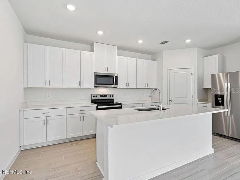 Furnished interior view inside a new home in Colbert Landings, Palm Coast (Image 8). Furnished interior view inside a new home in Colbert Landings, Palm Coast (Image 8).