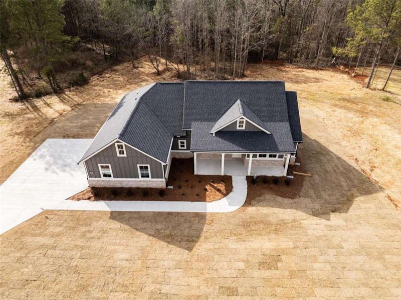 Front exterior of a new home in , Covington, GA, highlighting curb appeal (Image 2). Front exterior of a new home in , Covington, GA, highlighting curb appeal (Image 2).