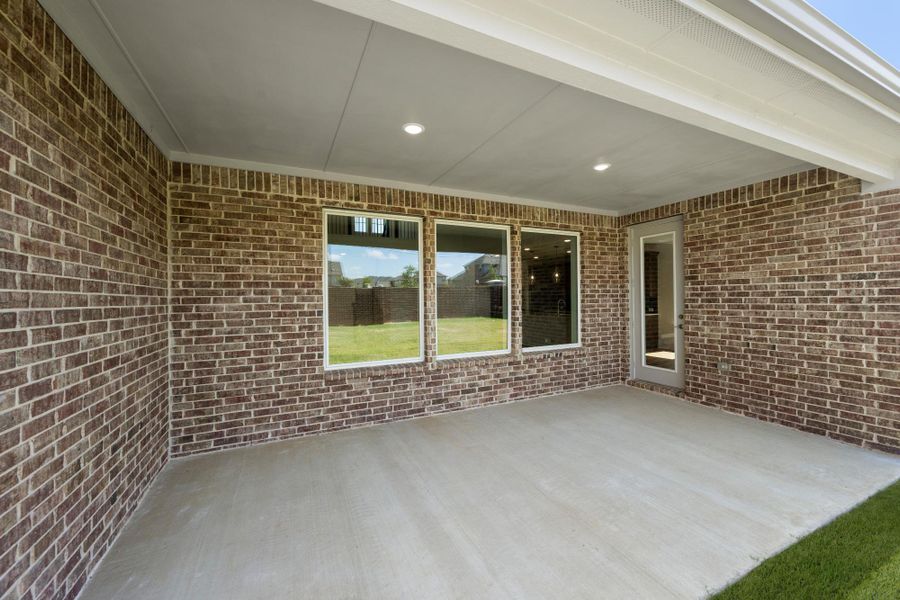 Exterior details and patio area of a home in Inspiration Collection at View at the Reserve, Mansfield (Image 3).