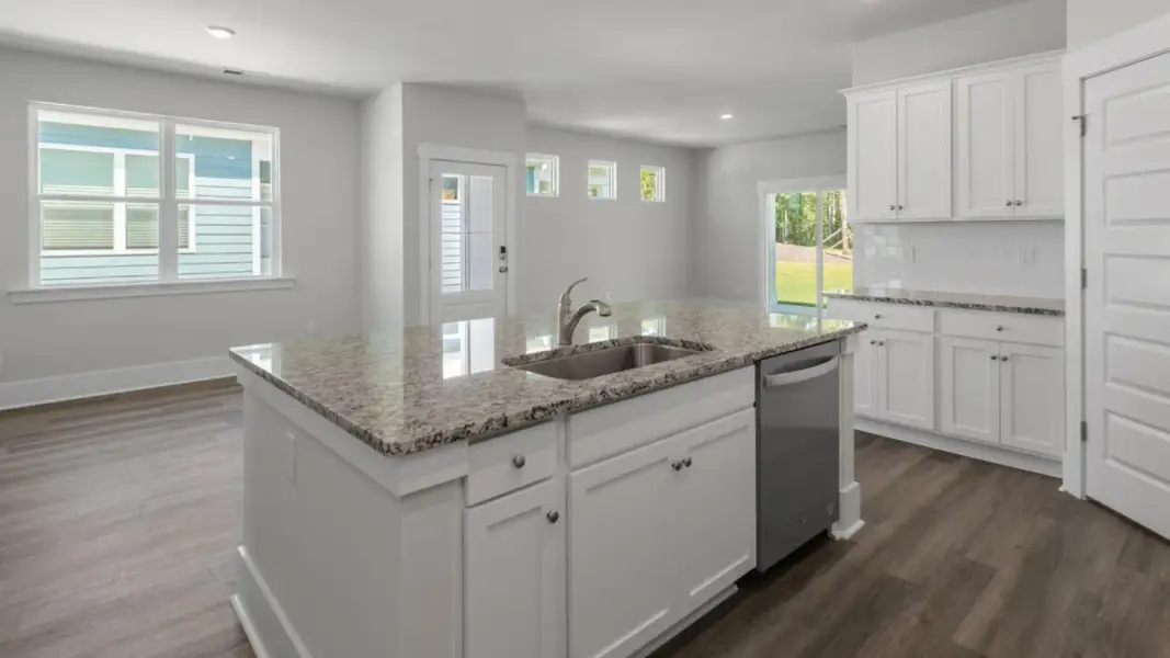 Furnished interior view inside a new home in The Retreat at Indigo Preserve Townhomes, Leland (Image 7).