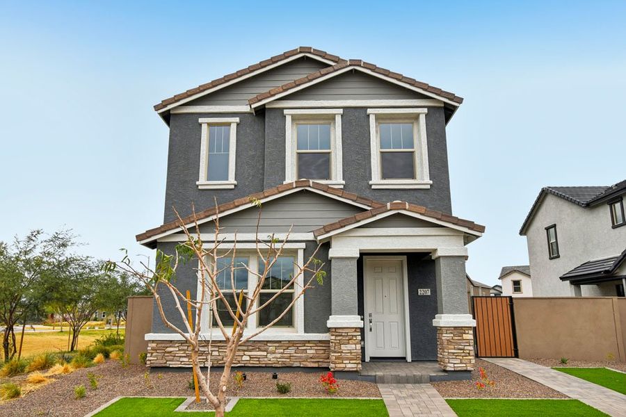 Representative exterior photo of a completed home built from the Pinnacle by Ashton Woods in Union Park at Norterra Phase 2, Phoenix, AZ (Image 25).