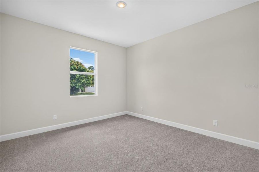 Spacious, unfurnished interior of a new home in , Port Charlotte (Image 28).