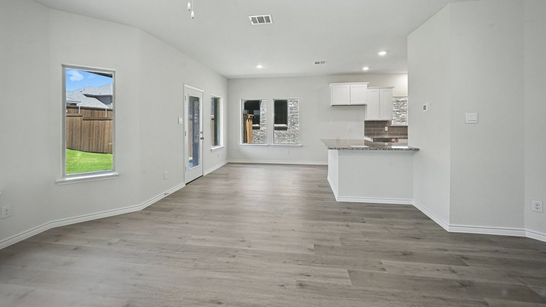 Representative furnished interior of a home built from the Aquamarine by D.R. Horton in Silverado, Aubrey (Image 9).