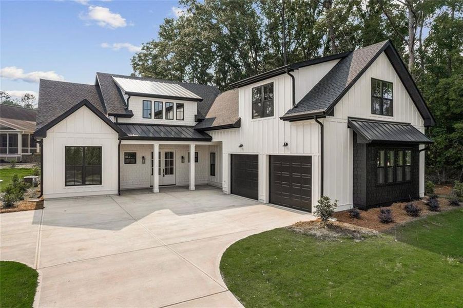 Front exterior of a new home in , Eatonton, GA, highlighting curb appeal (Image 1). Front exterior of a new home in , Eatonton, GA, highlighting curb appeal (Image 1).