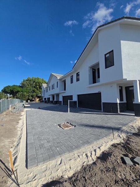 Front exterior of a new home in , Fort Lauderdale, FL, highlighting curb appeal (Image 7). Front exterior of a new home in , Fort Lauderdale, FL, highlighting curb appeal (Image 7).
